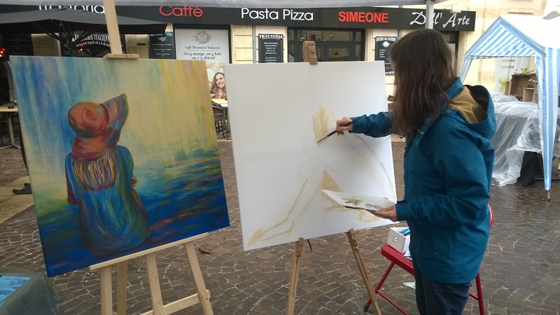 elize artiste peintre peindre en public tableau marché